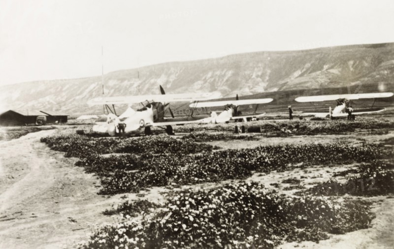 Royal Air Force biplanes, Palestine. Three Royal Air Force biplanes sit in an airfield in northern Palestine. British Mandate of Palestine (Middle East), circa 1938., Middle East, Asia.