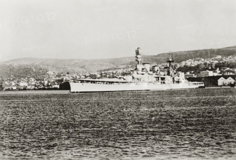 HMS Valiant at Haifa. View of the British battleship HMS Valiant, moored in the Mediterranean Sea at Haifa port. Haifa, British Mandate of Palestine (Israel), circa 1939. Haifa, Haifa, Israel, Middle East, Asia.
