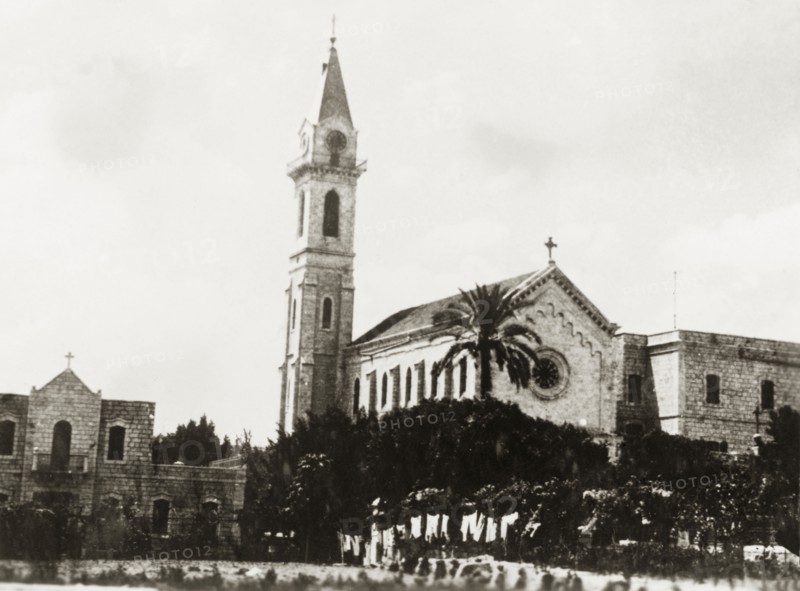 Catholic church in Jaffa. View of a spired Catholic church in Jaffa. Jaffa, British Mandate of Palestine (Israel), circa 1938. Jaffa, Tel Aviv, Israel, Middle East, Asia.
