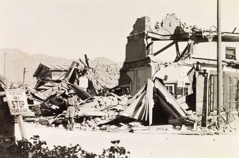 Earthquake damage in Quetta, 1935. A European man stands in the debris of a ruined building, reduced to rubble by an earthquake measuring 7.7 on the Richter scale. The earthquake hit Balochistan on 31 May 1935 and is thought to have killed between 30,000 to 60,000 people. Quetta, Balochistan, India (Pakistan), 1935. Quetta, Balochistan, Pakistan, Southern Asia, Asia.