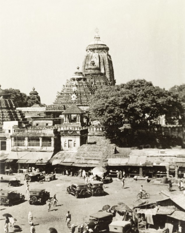 Jagannath Temple in Puri. View overlooking a town square in Puri, towards the Jagannath Temple, a Hindu temple dedicated to Lord Jagannath (a deity form of Krishna). An original caption comments that this square is the site of Puri's annual Rath Yatra festival. Puri, India, October 1934. Puri, Orissa, India, Southern Asia, Asia.