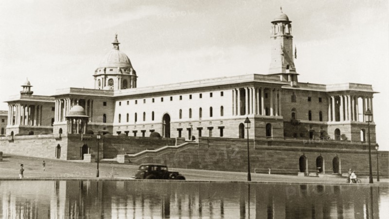 Secretariat building, Delhi. The Secretariat building in Delhi, one of a set of two buildings designed by British architect Sir Herbert Baker to accompany the Rashtrapati Bhavan (the official residence of the President of India). Built between 1912 to 1931 in a combination of Mughal and Rajputana architectural styles, the building is now used as Indian Government offices. Delhi, India, 1941. Delhi, Delhi, India, Southern Asia, Asia.