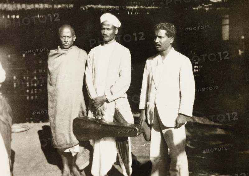 Methodist evangelist musicians. Two members of a Methodist evangelist band, one holding a violin case, during a visit to a rural Indian village. Karnataka, India, circa 1933., Karnataka, India, Southern Asia, Asia.