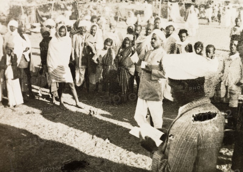 Evangelist preaching to villagers. Methodist evangelist R. Christadas preaches to a gathered crowd of Indian villagers. R. Christadas was accompanying British missionary Reverend Norman Sargant, who travelled throughout Mysore State preaching to rural Christian communities. Mysore State (Karnataka), India, 1933., Karnataka, India, Southern Asia, Asia.