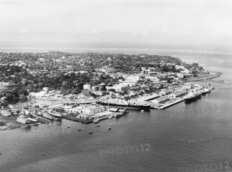 An aerial view of Suva, 1965. An aerial of Suva, the current Fijian capital, showing mostly the port and harbour facilities. Suva, Fiji, 1965 Suva, Viti Levu, Fiji, Pacific Ocean, Oceania.