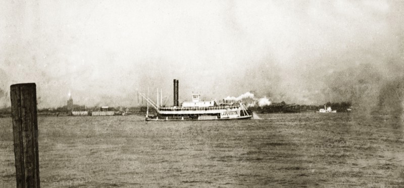 Grain boat, Mississippi'. A steamship carrying a shipment of grain travels along the Mississippi River. New Orleans, United States of America, March 1902. New Orleans, Louisiana, United States of America, North America, North America .