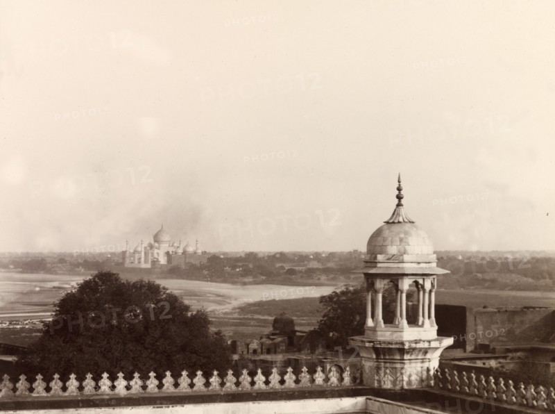 View from Moti Masjid, Agra. Distant view of the Taj Mahal taken from the Moti Masjid (Pearl Mosque) at the Agra fort complex. Agra, India, December 1902. Agra, Uttar Pradesh, India, Southern Asia, Asia.