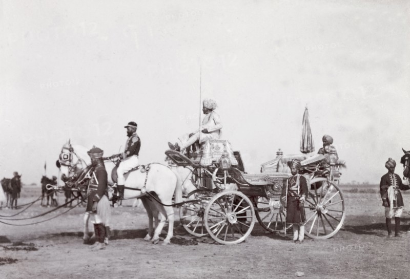 State carriage of Patiala, 1903. A team of white horses pull the ornate, silver state carriage of Patiala during a procession at the Coronation Durbar. Delhi, India, circa 1 January 1903. Delhi, Delhi, India, Southern Asia, Asia.