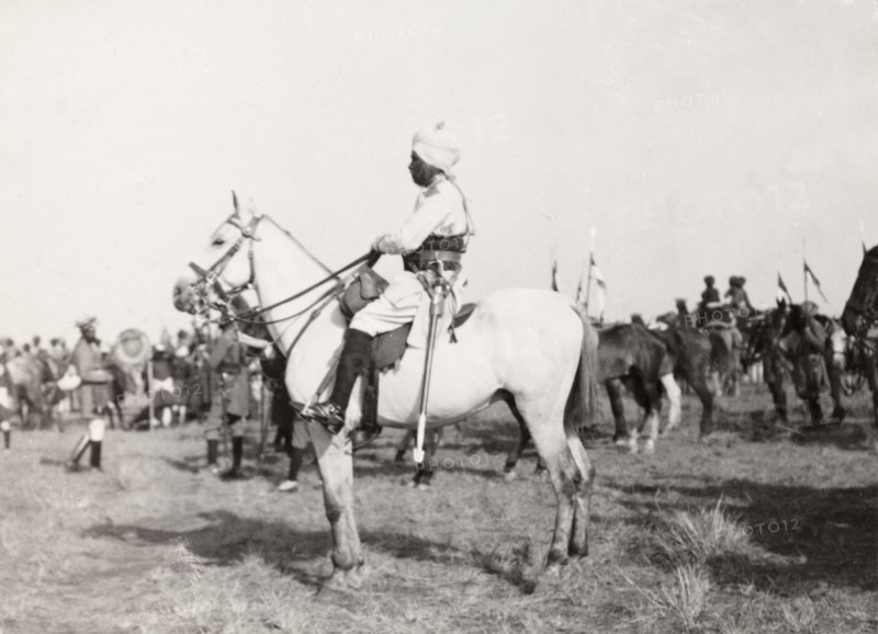 Indian dignitary at Coronation Durbar, 1903. Profile shot of an Indian dignitary mounted on horseback at Edward VII's Coronation Durbar. Delhi, India, circa 1 January 1903. Delhi, Delhi, India, Southern Asia, Asia.