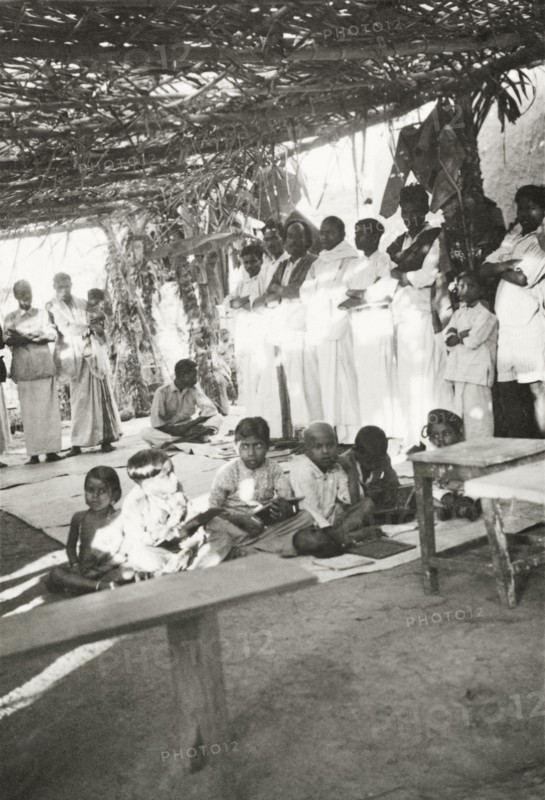 Night school at 'Maskal Maradi' estate. Children attend a night school class at a Methodist mission school at the 'Maskal Maradi' coffee plantation. Chikmagalur, Mysore State (Chikkamagaluru, Karnataka), India, circa 1937., Karnataka, India, Southern Asia, Asia.