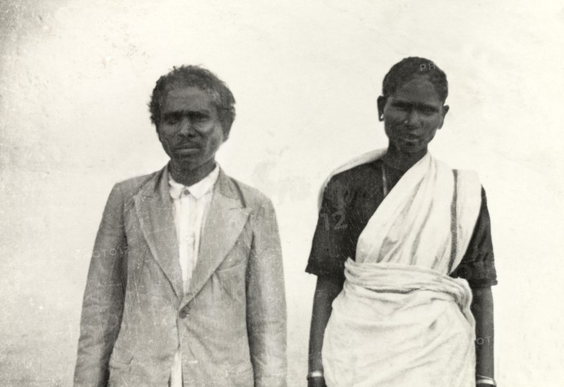 Methodist priest and his wife. Half-length portrait of a Methodist priest and his wife posing outside a church at 'Doopadcool Estate'. Mysore State (Karnataka), India, 1938., Karnataka, India, Southern Asia, Asia.