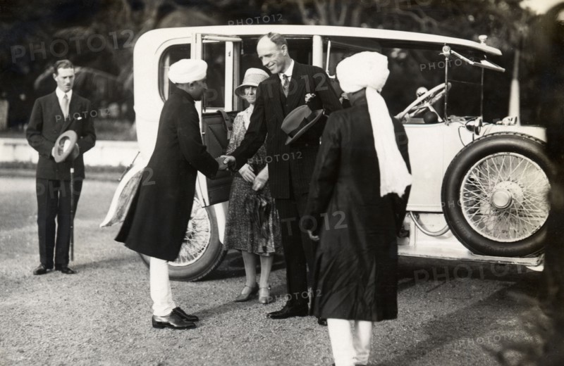 Lord Irwin arriving at Prime Minister of Indore's palace. Lord Irwin, Viceroy of India, is greeted by Indian dignitaries as he disembarks from a Rolls Royce upon arrival at the Prime Minister of Indore's palace. Indore, Indore State (Madhya Pradesh), India, 2 August 1928. Indore, Madhya Pradesh, India, Southern Asia, Asia.