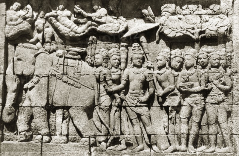 Relief panels at Borobudur . One of many relief panels at the ninth century Buddhist monument of Borobudur. Borobudur contains 1,460 narrative panels depicting Buddhist stories and beliefs, and 1,212 decorative panels. Java, Indonesia, July 1940., Java, Indonesia, South East Asia, Asia.