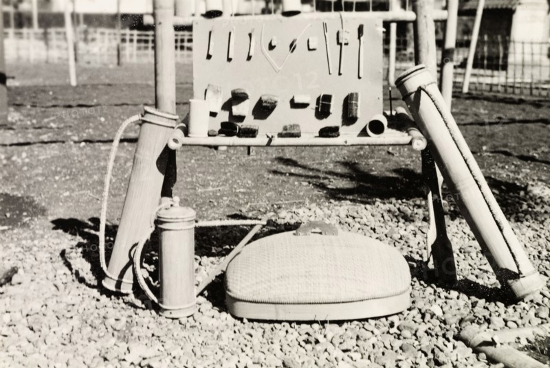 Samples of health products, North Borneo. A display of hygiene aids made by trainee health officers at Keningau Health Centre. Arranged on the display table are bamboo water containers and cups, and toothbrushes and nail brushes made of coconut husks. Keningau, North Borneo (Sabah, Malaysia), circa 1937. Keningau, Sabah (North Borneo), Malaysia, South East Asia, Asia.