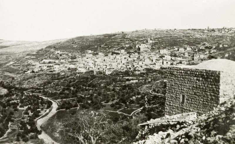 The village of Lifta, circa 1938. A twisting road winds its way down a hillside beneath the Arab village of Lifta. Lifta's proximity to the Jerusalem-Jaffa highway made it a strategic Zionist target and by February 1948, the village's Arab occupants had been displaced: their homes, businesses and farms destroyed. Lifta near Jerusalem, British Mandate of Palestine (Israel), circa 1938. Lifta, Jerusalem, Israel, Middle East, Asia.