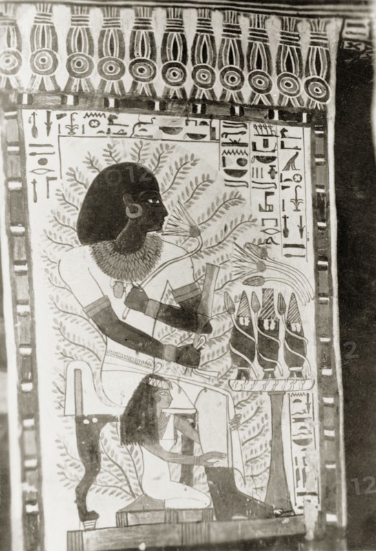 Fresco in the burial chamber of Sennefer. Close-up shot of a fresco in the burial chamber of Sennefer, a nobleman of Ancient Egypt and Mayor of Thebes (Luxor) during the reign of Amenhotep II. Sennefer is depicted beneath a sycamore tree with his wife Meryt, holding a lotus flower and a sekhem sceptre as a symbol of power and authority. Sheikh Abd el-Qurna near Luxor, Egypt, February 1945. Luxor, Qina, Egypt, Northern Africa, Africa.