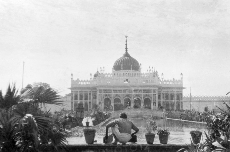 The Chhota Imambara in Lucknow. A figure crouches in front of an ornamental pool at the Chhota Imambara (or Hussainabad Imambara), a Shia Islam mausoleum built by Nawab Muhammad Ali Shah (r.1837-42) in 1837. Lucknow, United Provinces (Uttar Pradesh), India, January 1934. Lucknow, Uttar Pradesh, India, Southern Asia, Asia.