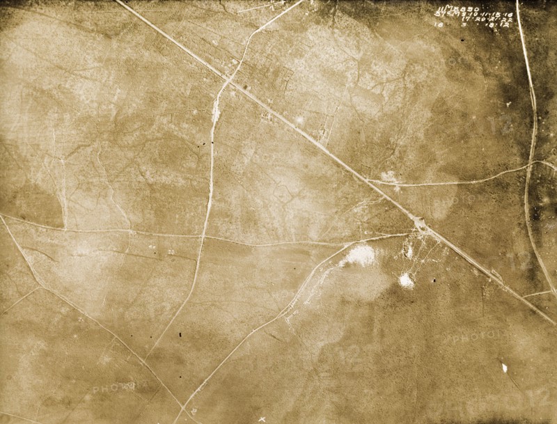Le Sars and the Butte de Warlencourt, 1918. One of a series of British aerial reconnaissance photographs recording the positions of trenches on the Western Front during the First World War. An original caption identifies the village of Le Sars (top middle) and the Butte de Warlencourt (right of centre), an ancient burial ground located on the old roman road running from Albert to Bapaume. Le Sars, Nord-Pas de Calais, France, 18 March 1918. Le Sars, Nord-Pas de Calais, France, Western Europe, Europe .