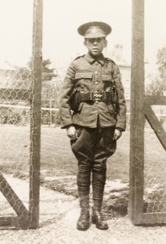Private James Murray. Full-length portrait of Private James Murray, standing to attention in full military uniform during his first year at Eastbourne College. Eastbourne, England, 1920. Eastbourne, Sussex, England (United Kingdom), Western Europe, Europe .