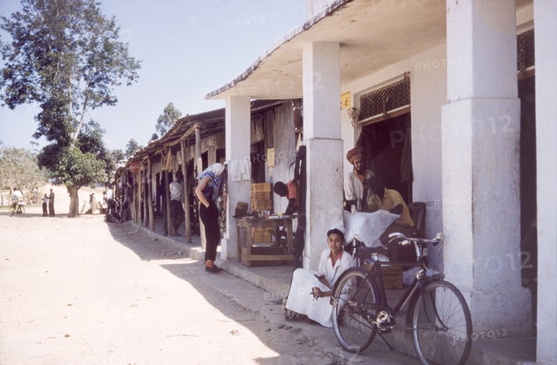 Dukas on the Tanganyika-Uganda road. A row of typical East African dukas (shops) flanks the Tanganyika-Uganda road. Kyaka, Tanganyika Territory (Tanzania), August 1960., Kagera, Tanzania, Eastern Africa, Africa.
