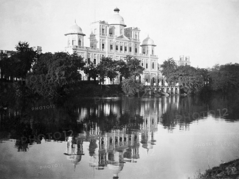 The Chattar Manzil in Lucknow. The Chattar Manzil (housing the United Services Clucb) with a Neo-classical facade and Indian-style cupolas overlooks a lake. Lucknow, United Provinces (Uttar Pradesh), India, 1936. Lucknow, Uttar Pradesh, India, Southern Asia, Asia.