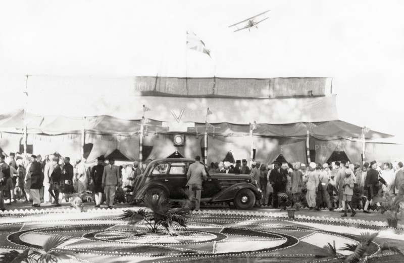 Reception at Jansath. An aircraft flies over guests at a reception at Jansath. Muzaffarnagar, United Povinces (Uttar Pradesh), India, 2 January 1942., Uttar Pradesh, India, Southern Asia, Asia.
