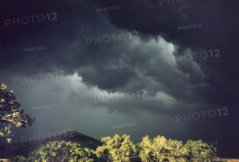 Storm over Lake Saka. Heavy black storm clouds gather over Lake Saka. Near Fort Portal, West Uganda, 1955., West (Uganda), Uganda, Eastern Africa, Africa.