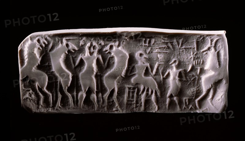 Modern impression of an early dynastic Sumerian alabaster cylinder seal