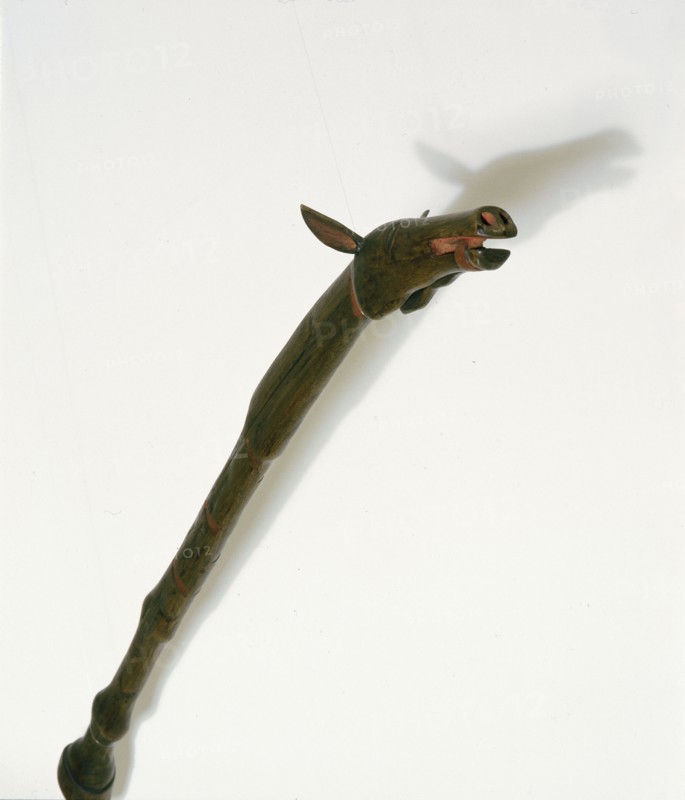 Horse dance stick carved by a warrior to honour his favourite horse killed in battle