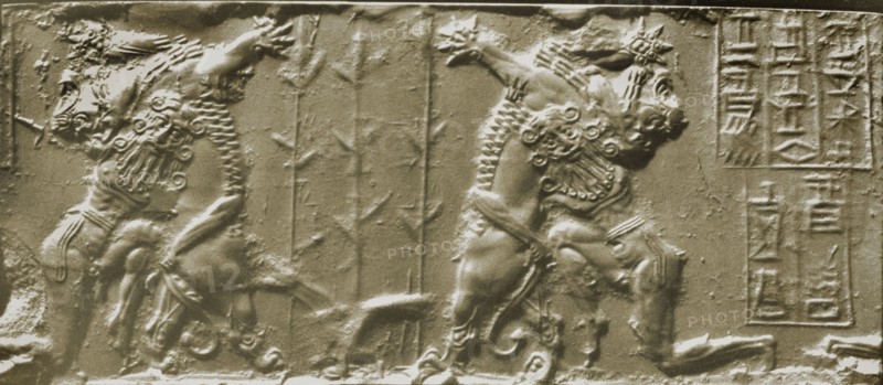 cylinder seal depicting the naked hero, Gilgamesh wrestling with a lion