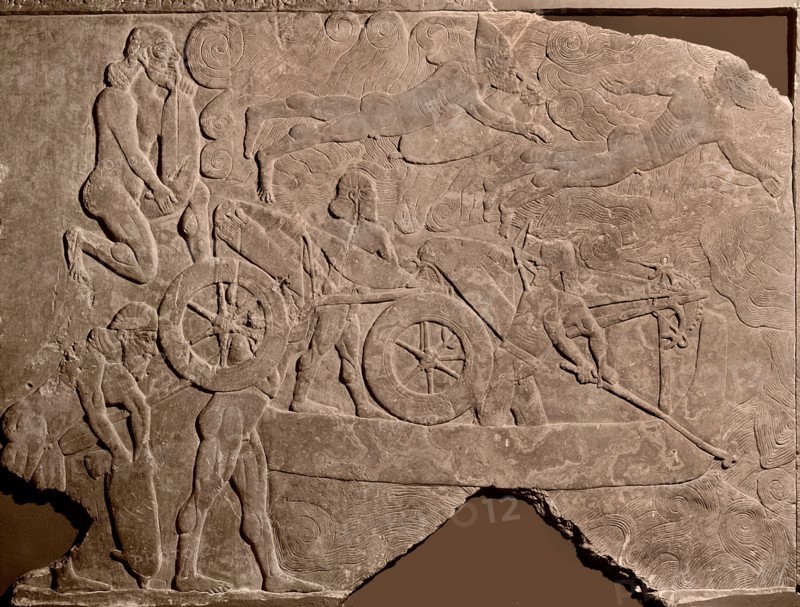 Detail of a relief showing Assyrian troops crossing a river with a chariot on a float