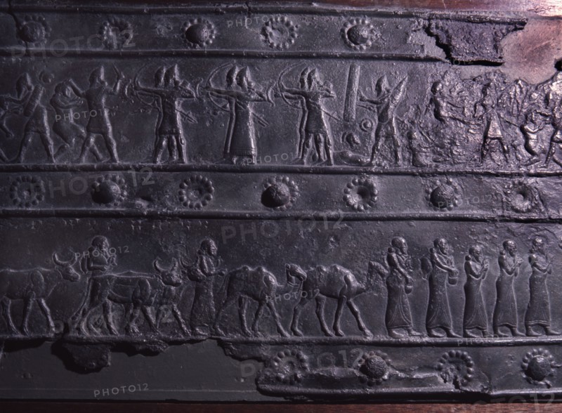 The wooden gates of Shalmaneser III with bands of relief decoration in bronze
