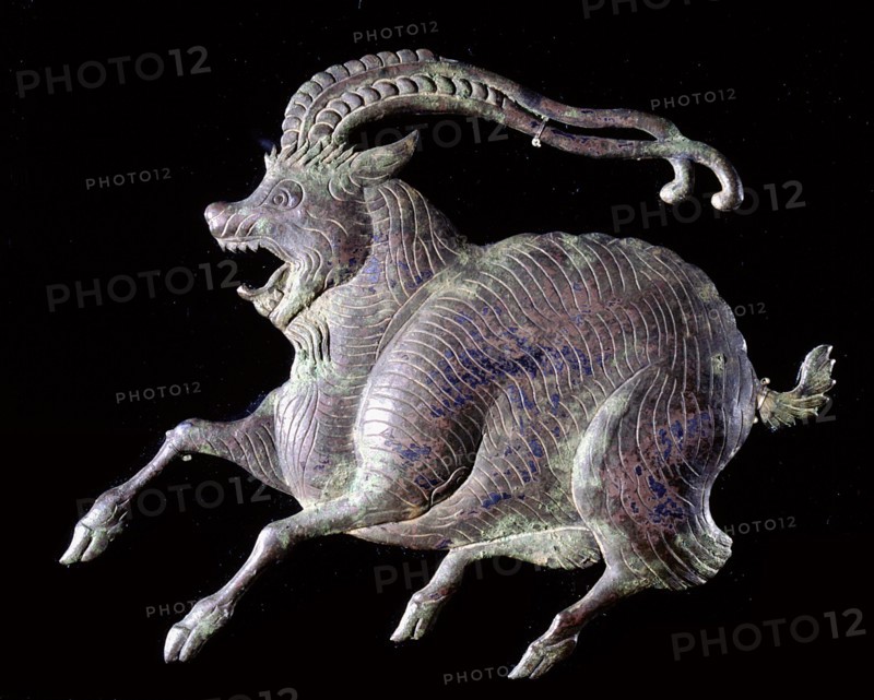 Plaque in the form of a fantastic animal with exaggerated horns