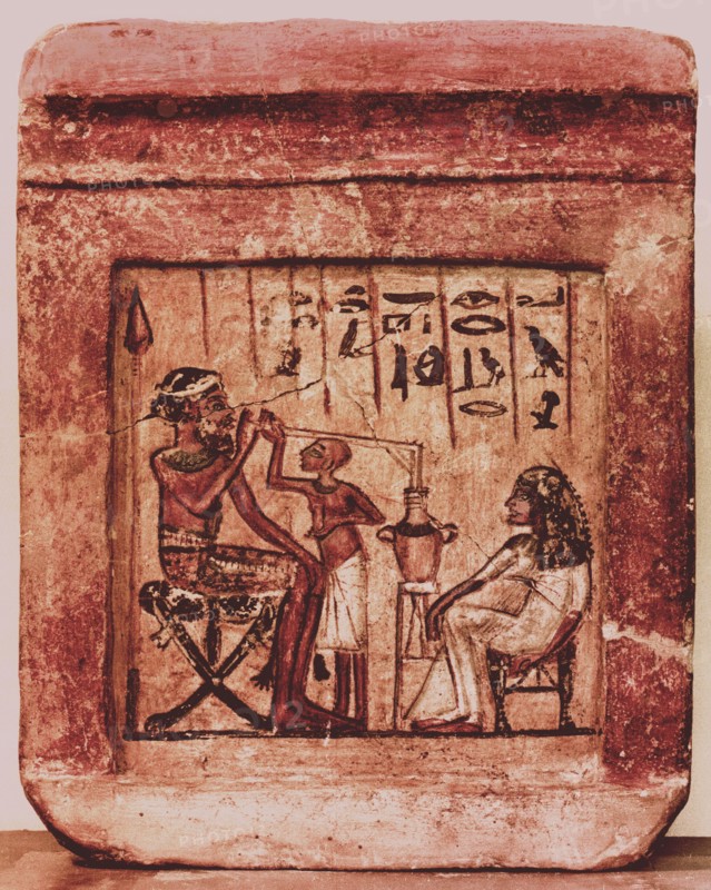 Painted relief depicting a Syrian warrior drinking through a tube from a two handled jar