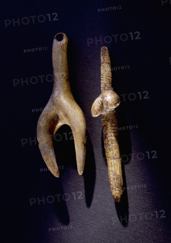 Stylised female figurines carved from mammoth bone