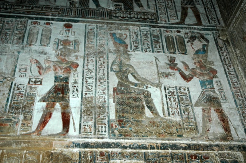 Painted relief carving from The Sanctuary of ritual offerings being made by the pharaoh to the goddess Hathor