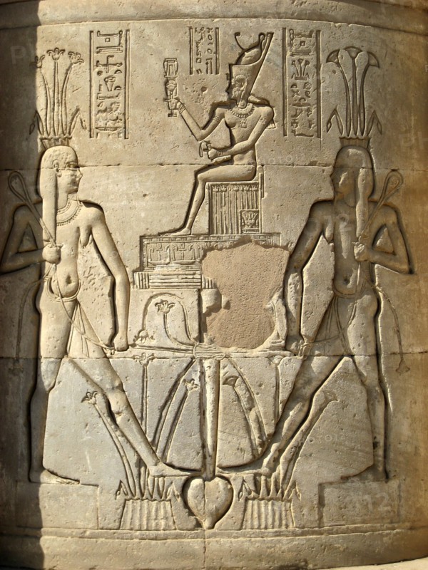 Carved relief on one of the cylindrical columns in the Hall of Appearance with depictions of the god Hapy, deification of the annual Nile floods