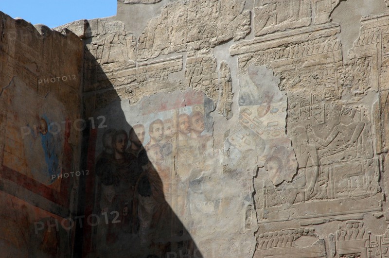 Wall reliefs from the period of Amenhotep III plastered over during Roman times with colourful images of Roman Emperors prior to the conversion into a Christian Chapel