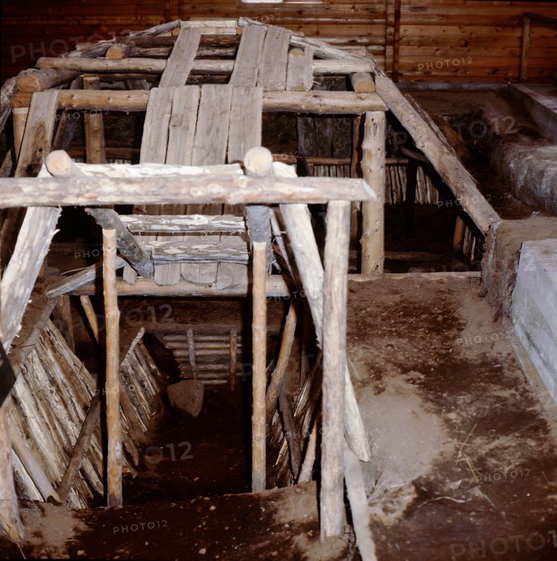 Winter houses in Southwest Alaska were dug a metre or more into the ground, lined with timber and covered with sod