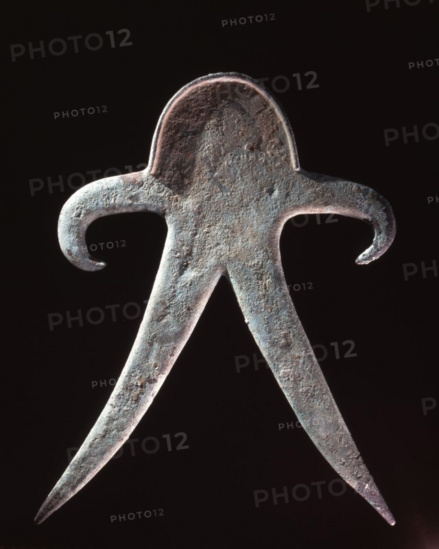 Anthropomorpic figure from a copper hoard, probably used as a cult object