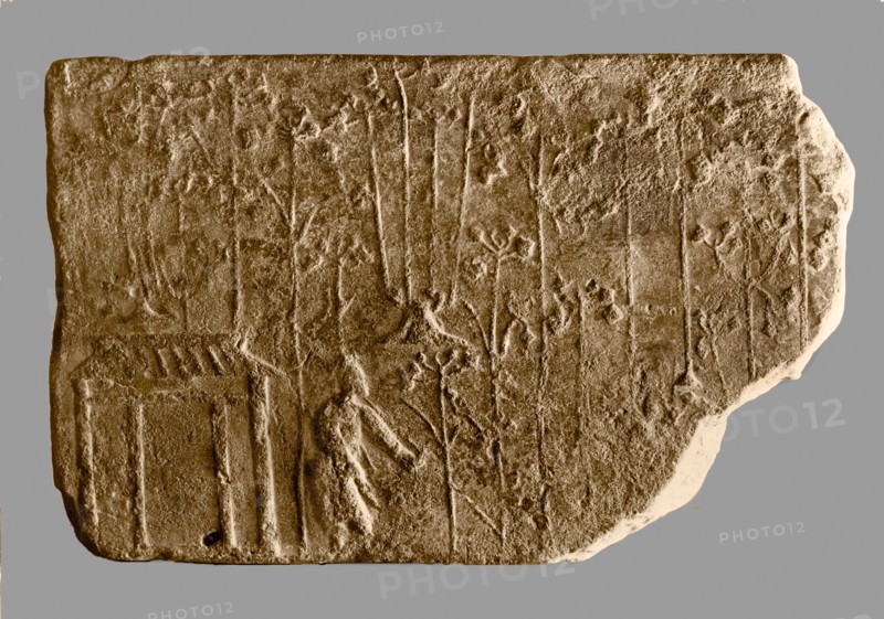 Brick from a tomb structure impressed with design of agricultural scene