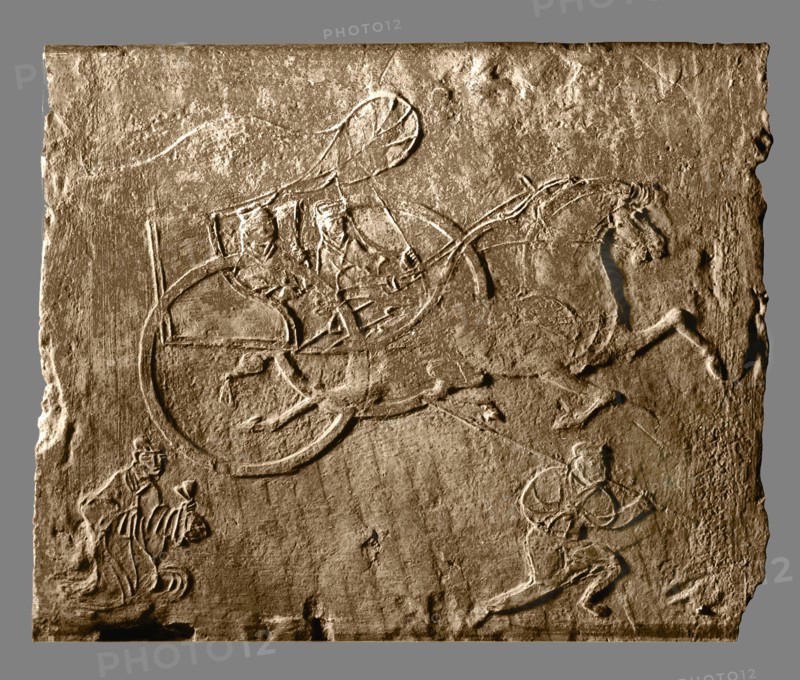 Brick from a tomb structure impressed with a carriage and footmen