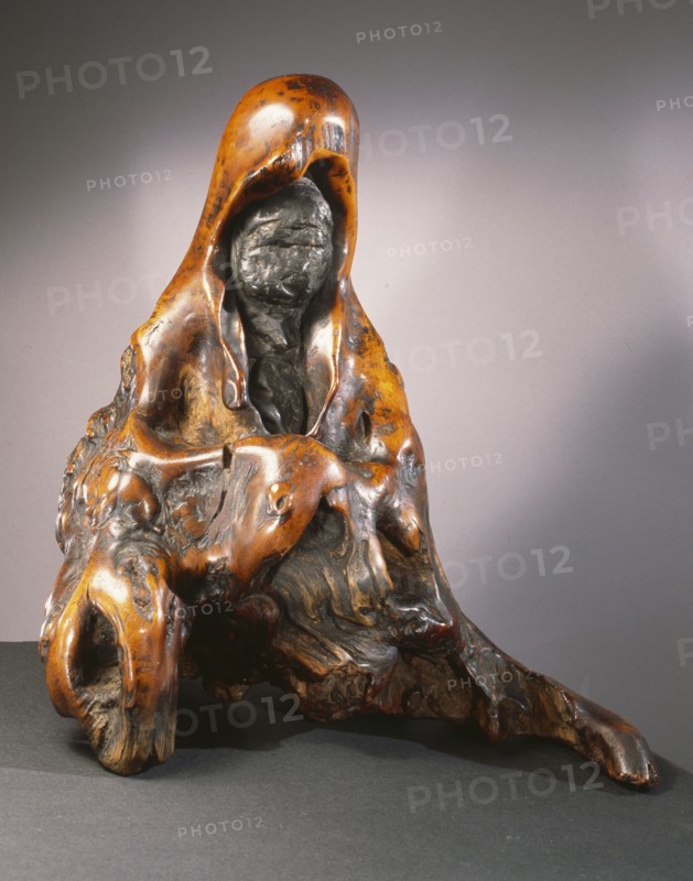 A decorative ornament okimono of Kannon, a type of Bodhisattva