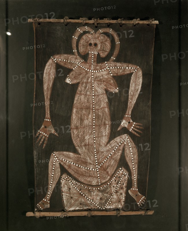 Bark painting from western Arnhem Land depicting a seated woman