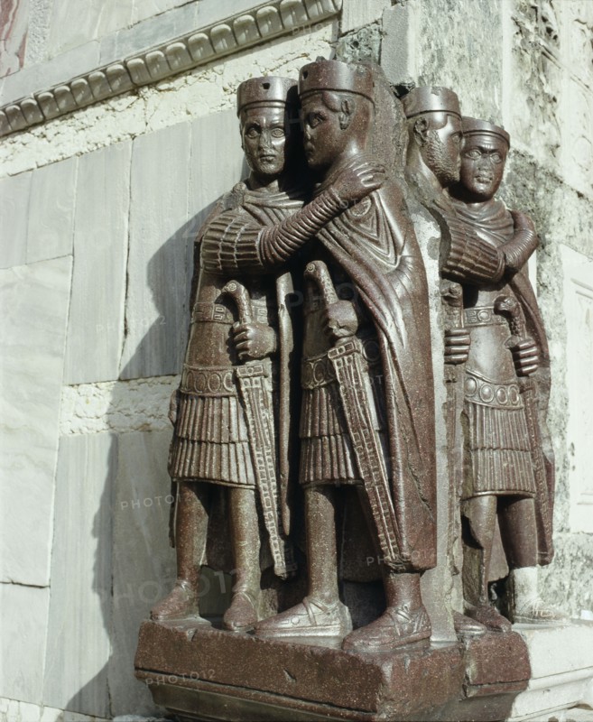 As there was a short period early in the 4th century when there were four emperors ruling similtaneously over the vast but disintegrating Roman Empire, it is usually thought that this group of embracing emperors in St Marks Venice represents the intended harmony of their rule