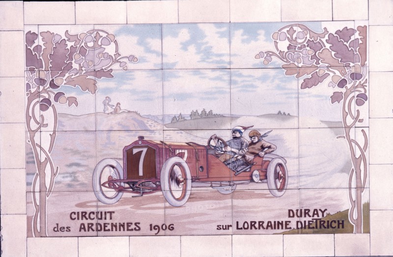 Decorative tile of famous racing car of the time which used Michelin tyres