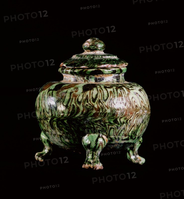 Green and brown glazed vessel with lid on three legs