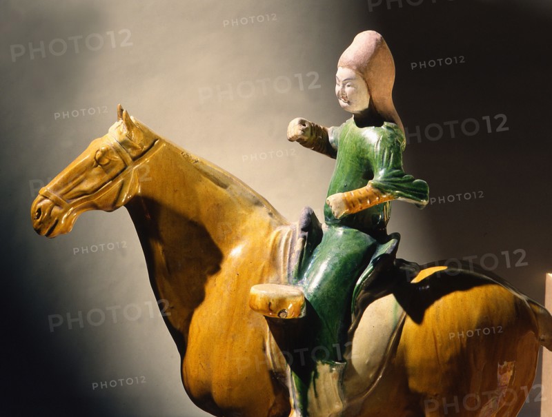 Detail of a tomb figure in the form of a drummer mounted on a horse