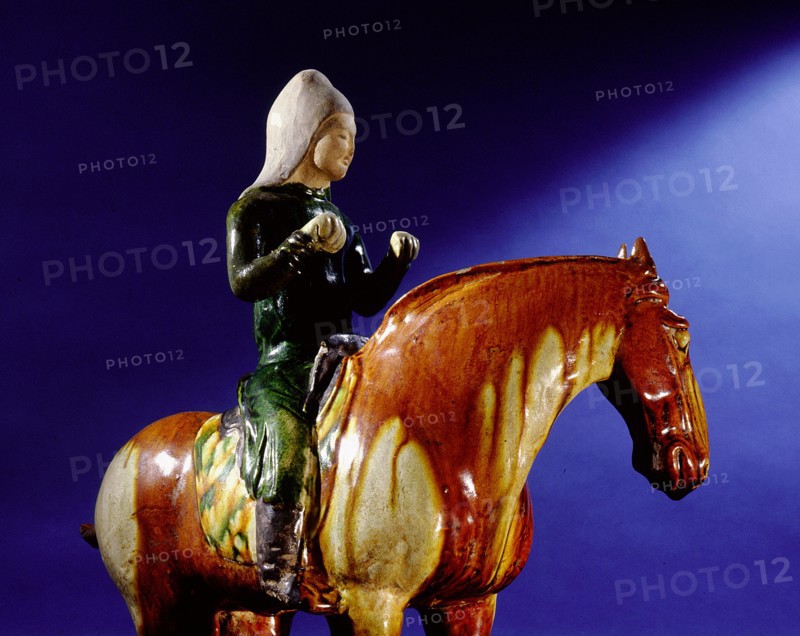Detail of a tomb figure in the form of a musician (drummer) mounted on a horse