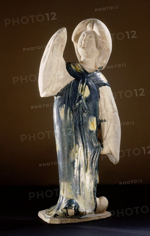 Blue glazed figure of a court lady with one arm raised